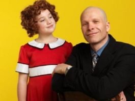 Julia MacLean is Annie and Steve Maddock is "Daddy" Warbucks in the Royal City Musical Theatre 25th anniversary production of Annie. Photo by David Cooper.