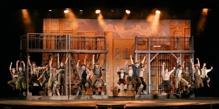The cast of the Theatre Under the Stars production of Disney's Newsies. Photo by Lindsay Elliott.