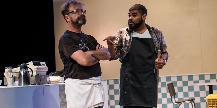 David Nykl and Chris Francisque in the Ensemble Theatre Company of Superior Donuts. Photo by Zemekis Photography.